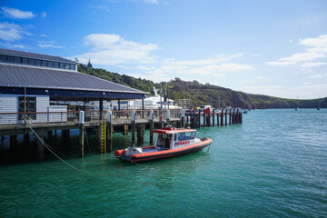 Tranquil Harbor View with Boat and Dock