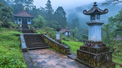 Obraz premium Tranquil temple pathway in misty mountain landscape serene atmosphere nature photography peaceful retreat