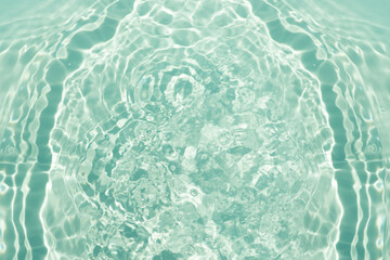 Blue water with ripples on the surface. Defocus blurred transparent blue colored clear calm water surface texture with splashes and bubbles. Water waves with shining pattern texture background.