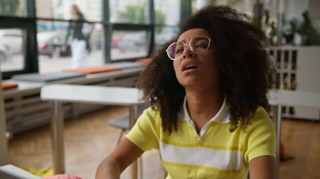 Angry mad stressed frustrated disappointed African American woman girl student female problem with laptop broken low battery error app trouble failure online e-learning studying internet in university