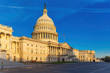 Obraz premium The exterior of the US Capitol Building which houses the Senate and the House of Representatives in Washington DC.