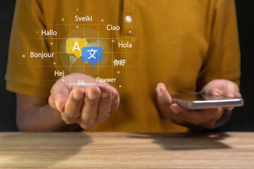 Multilingual language translation concept. Man using a smartphone to translate different languages.