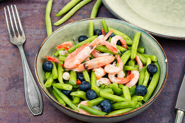 Salad with shrimp and beans, healthy concept.
