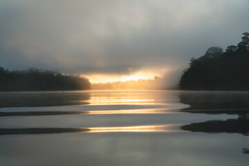Early morning in the fog at Kinabatangan River in Sukau, Sabah, Borneo, Malaysia