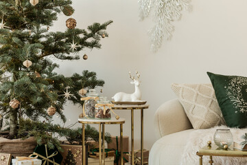 Charming Christmas corner with a tree, wrapped presents, and a cozy sofa. Inviting holiday home decor in soft tones.