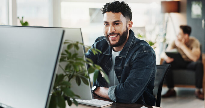 Computer, smile and web development with man in creative workplace for coding or design. Cybersecurity, programming and system infrastructure with happy employee person in office as website developer - Powered by Adobe