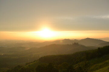 Obraz premium Grey with orang sky sunset over the mountain