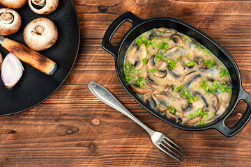 Mushrooms in creamy sauce.