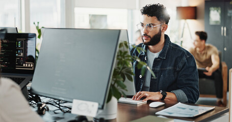 Computer engineering, programming and web development with man in creative workplace for design....