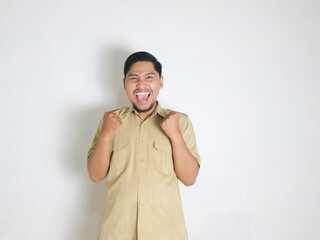 Asian male Indonesian civil servants wearing brown uniforms; usually called keki; look very happy...