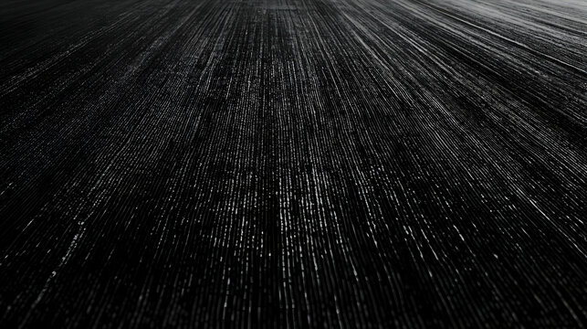 Abstract black and white image of parallel lines converging at a vanishing point, suggesting speed, movement, or depth.  Ideal for backgrounds or design projects.