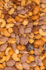 A group of almonds, pistachios, walnuts, macadamia, cashews.