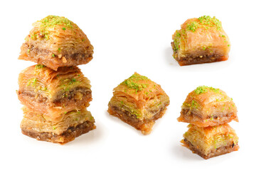 Pistachio baklava on a white background. Dessert.