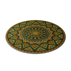 A round rug with a green and yellow design