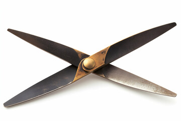Vintage brass and steel scissors isolated on white background. Perfect for crafting, design, or antique themes.