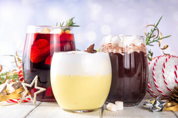 Hot drink cafes menu background, with mulled wine, eggnog and hot chocolate traditional Christmas...
