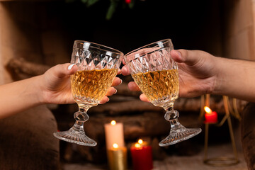 Romantic Evening Toast with Wine Glasses by Candlelight
