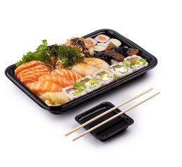 exotic colorful japanese oriental sushi combo tray delivery with soy sauce and chopsticks