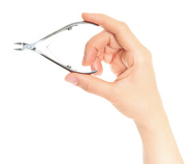 Woman hand holds cosmetic cuticle nippers, isolated on transparent background, cosmetics and visage concept