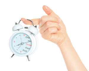 Woman hand holds white Alarm Clock, isolated on transparent background, time and home things concept