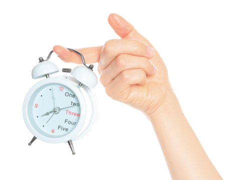 Woman hand holds white Alarm Clock, isolated on transparent background, time and home things concept