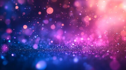 Abstract purple, pink, and blue glitter bokeh background.