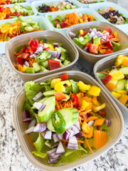 Meal Prep with Colorful Salads in Containers