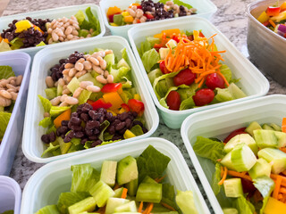 Meal Prep with Colorful Salads in Containers
