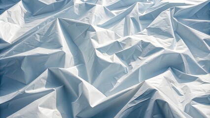 Obraz premium Wrinkled and glued paper in a serene mood, showcasing intricate textures and folds, against a soft, white background.