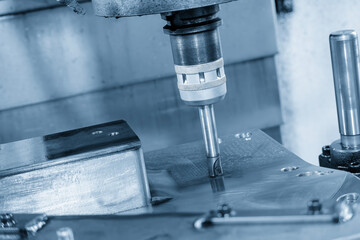 The CNC milling machine rough cutting the injection mold parts by indexable tools.