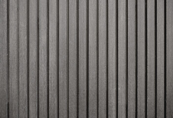 Empty dark gray wood wall with groove, abstract wall texture background.Grey wall with patterns, space for work, banner, wallpaper, copy space, decoration and design.