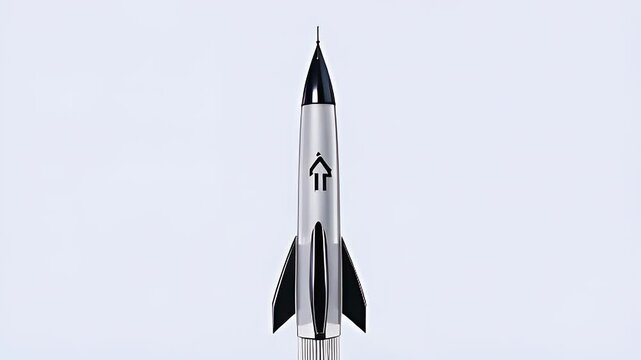 A sleek silver bullet pen resembles a futuristic rocket. Symbolizes technology and creativity with minimalist design.