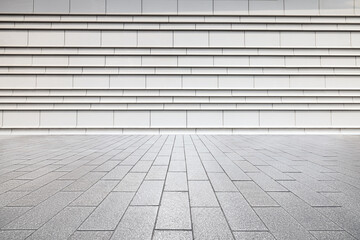 Empty brick floor and modern building background