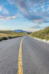 Empty asphalt road and mountains background