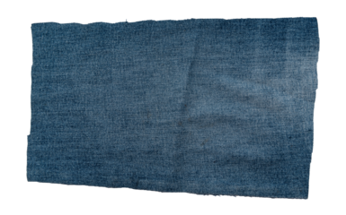 Piece of torn denim on a white background. Denim texture