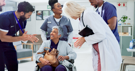 Applause, medical staff and woman in wheelchair for recovery, healing and surgery success in...