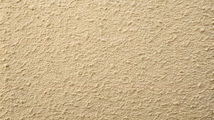 Beige textured wall with rough plaster finish