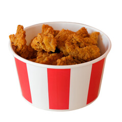 A bucket filled with crispy, golden fried chicken pieces. © KP Stocker