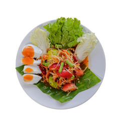 A colorful plate of salad featuring fresh vegetables, sliced eggs, and vibrant toppings garnished with lettuce and herbs.