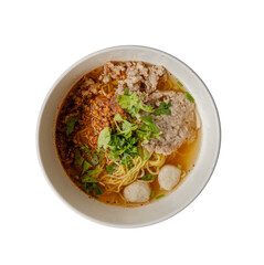 A bowl of noodles topped with minced meat, meatballs, and fresh herbs.