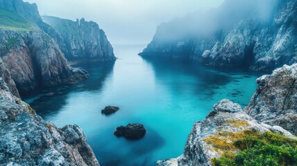 Tranquil Coastal Landscape with Rugged Cliffs and Misty Waters at Dawn, Capturing the Serene Beauty of Nature in a Remote Seaside Location