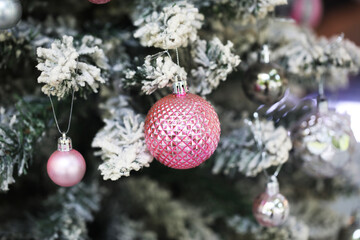 Pink Christmas ornaments for New year holiday decorations