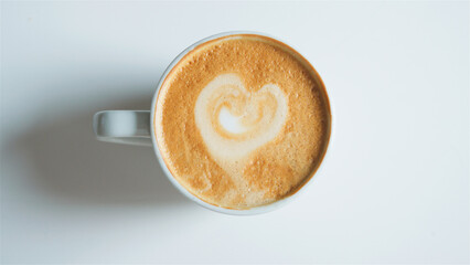 Overhead View Of Fresh Coffee With Heart Shape Art Design In Foam