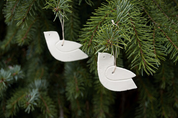 White birds handmade ornaments hanging on christmas tree, Dove, Peace, Clay, Peaceful Holidays