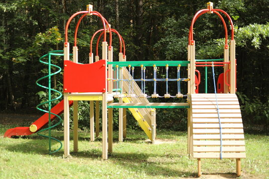 A playground in the park. A place to play. A playground in the park for children to play.