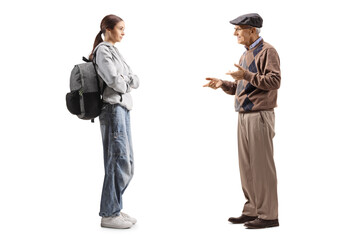 Grandfather talking to teenage granddaughter