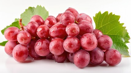 Fototapeta premium A cluster of fresh, dewy red grapes with green leaves, showcasing their natural beauty.