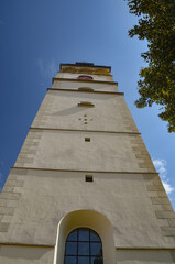 Cathedral of the Nativity of the Blessed Virgin Mary in Żywiec – a temple built in the fifteenth century with a high tower with a clock on it © Pawel Filusz