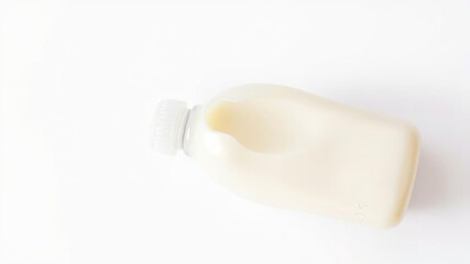 Newborn milk formula in a plastic bottle isolated against a white background, nursery decor, baby essentials