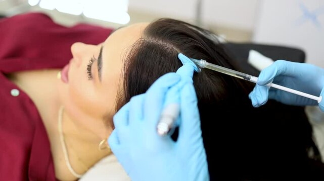 Video of a young woman undergoing platelet-rich plasma or PRP treatment at a modern clinic.